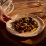 Barbecued Fremantle octopus with tomato pesto and rocket. 