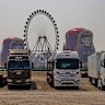 Trucks from Russia and Belarus wait for custom clearance at a parking lot in Manzhouli, a Chinese town on the border of Russia. 