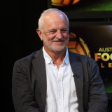 Socceroos coach Graham Arnold was fined $25,000 by his employers for breaking self-isolation rules.