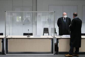 The dock sits empty in a courtroom in Itzehoe where the trial of a 96-year-old woman was due to start.