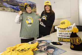 Senator Jacqui Lambie (right) shows off some of her merchandise with Senate candidate Tammy Tyrrell.