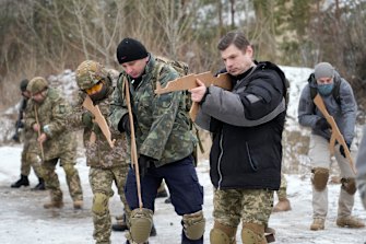 Members of Ukraine’s Territorial Defence Forces, volunteer military units of the Armed Forces, train close to Kyiv, Ukraine, on Saturday.