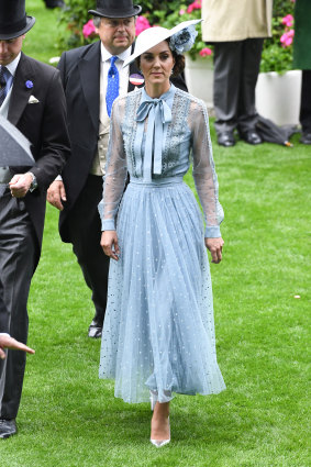 Romantic royal ... the Duchess of Cambridge embracing the uber-femme at Ascot.