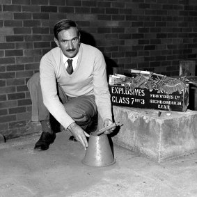 Mr R. Welch, testing fireworks in Sydney on May 18, 1961.