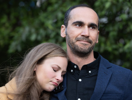 Refugee Mostafa “Moz” Azimitabar with friend, and former Australian of the Year, Grace Tame.