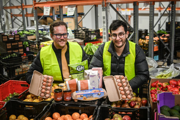 Josh Ball (left) and Josh Brooks-Duncan says there is plenty of high quality packaged food that needs saving from going to waste.