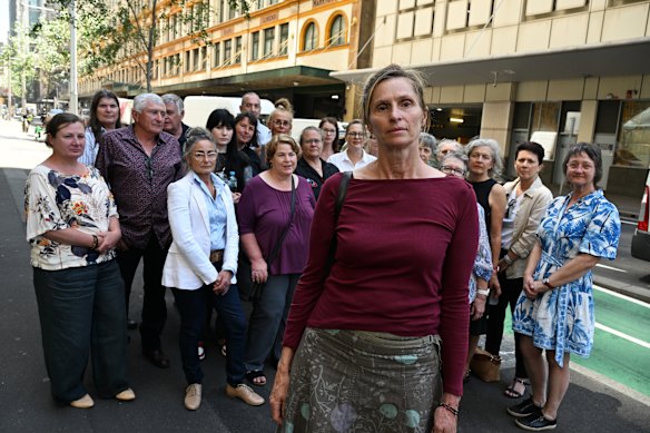 Tracy Dods with some of her supporters outside the Downing Centre during a court break on Thursday.