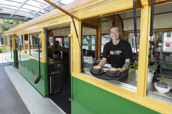 Tram Cafe in a restored W-class tram in front of William Angliss Institute on La Trobe Street, Melbourne.
