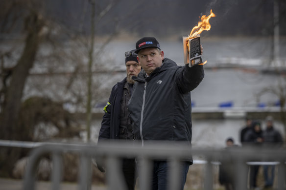 Controversial Danish far-right MP Rasmus Paludan, also a Swedish citizen, burns the Koran outside the Turkish embassy in Stockholm last weekend.