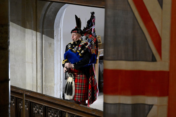 Pipe Major Paul Burns of the Royal Regiment of Scotland helps to close Queen Elizabeth II state funeral with a rendition of the traditional piece Sleep, Dearie, Sleep.