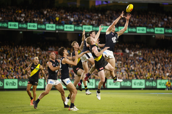 Carlton’s Tom De Koning flies for the ball in the 2023 season-opening match against Richmond.