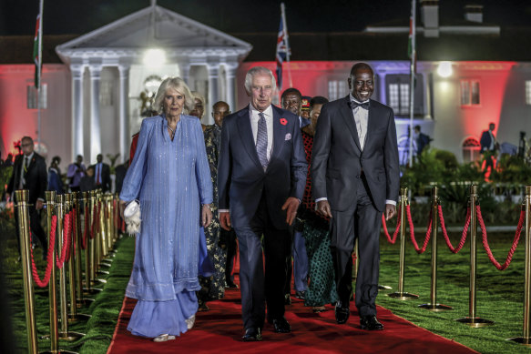 King Charles, Queen Camilla and Kenyan President William Ruto arrive for the state banquet at the State House in Nairobi, Kenya.