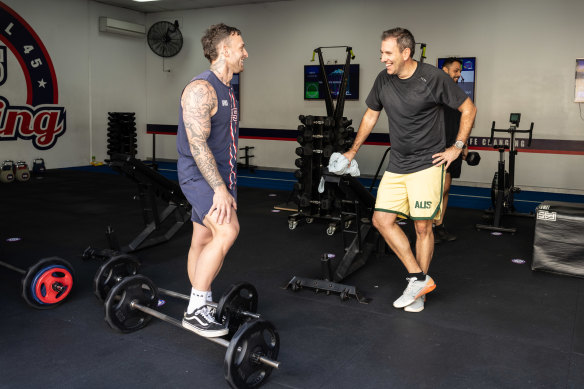 Chalmers with Tyson Deen, the manager of his local F45 gym, after an early-morning workout.