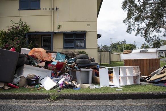 ADF personnel help clear flood damaged household items in North Haven.