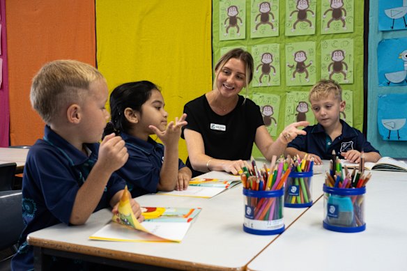 Kindergarten teacher Taylah Granger with students at The Entrance Public School.