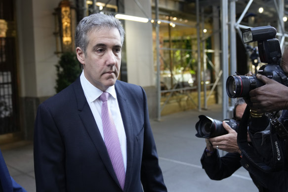 Michael Cohen leaves his apartment building on his way to Manhattan Criminal Court in New York during the trial.