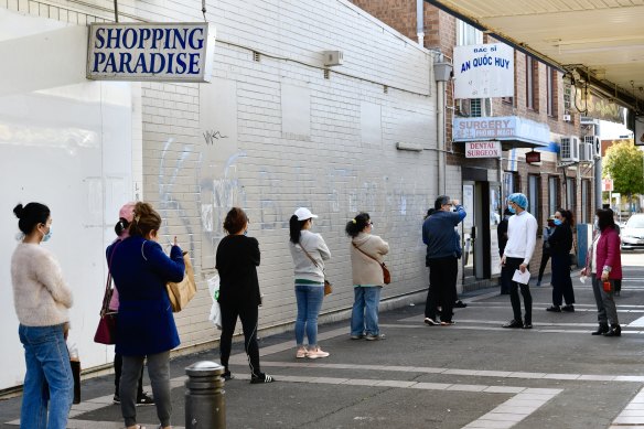 People awaiting Pfizer COVID vaccine shots in Cabramatta.