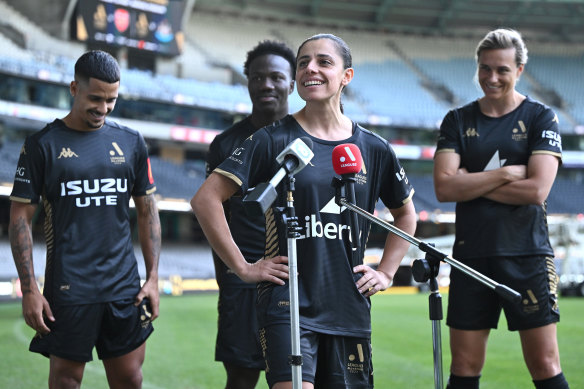 Alex Chidiac helps unveil the uniform for the A-League All Stars at Marvel Stadium.