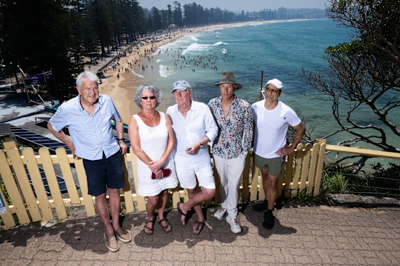 Manly residents John Lehmann, Sheridan Nossiter, Michael Nossiter, Guy Evatt and Michael Hayja, pictured overlooking Manly Life Saving Club, have concerns over the council’s proposal.