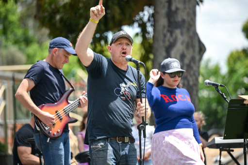 Having a rocking good time: Phil Isard singing with Middle Park primary school parents’ band Middle Sparks.