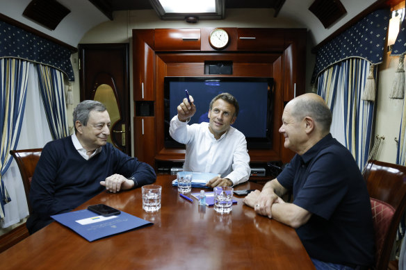 Macron, centre, Scholz, right, and Italian Draghi worked late into the night “to align their positions” before meeting Ukraine’s President Volodymyr Zelensky. 