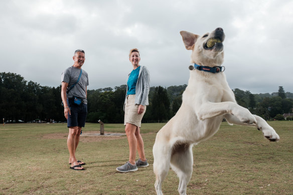 Julie Alexander and Warren Bingham with their dog Billie at the off-leash area at Bayview.