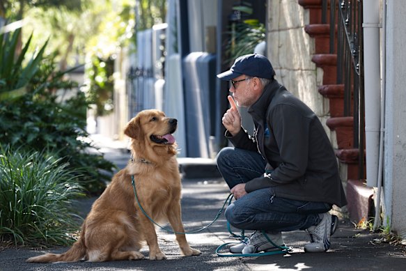 Dog trainer Mark Ehrman with his dog, Brooklyn. 