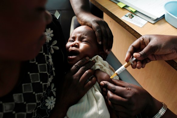 Current malaria vaccines are usually less than 90 per cent effective and need multiple doses, which is not ideal in the poverty-stricken areas where malaria is most deadly. This photo is of another trial vaccine in Kenya.