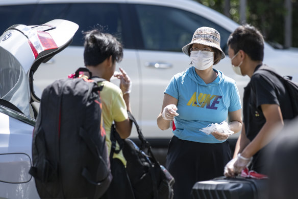Students from Epping Boys High School return from an excursion after a student at the school tested positive to COVID-19.