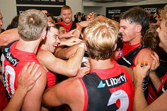 Bombers celebrate their win.