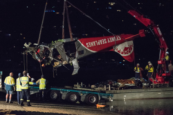 The wreckage of the plane is recovered by police and transport safety authorities on January 4, 2018.