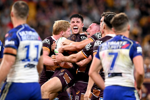 Cory Paix celebrates after scoring a try for the Broncos in round seven against the Canterbury Bulldogs at Suncorp Stadium in April last year.