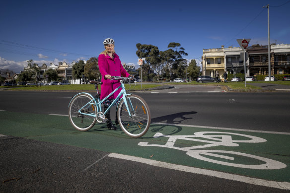 McCormack says the painted bike lanes is not good enough.