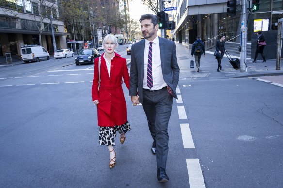 Constantine Arvanitis outside Melbourne’s County Court with his fiancee, Melanie Thornton, after the first day of his defamation trial against former partner Selina Holder.