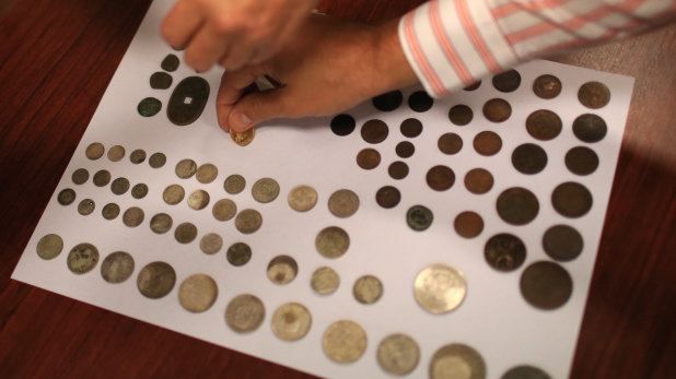 Coins from around the world were found in the time capsule.