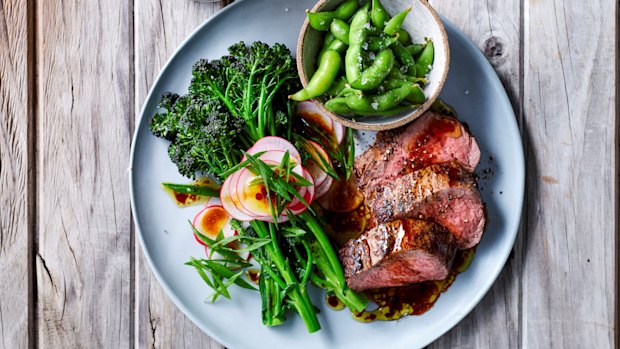 Soy-marinated steak with broccolini and edamame salad.