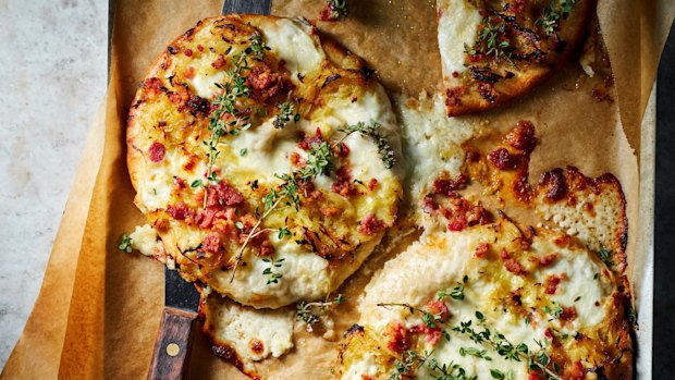 Caramelised cabbage and pancetta pizzas.