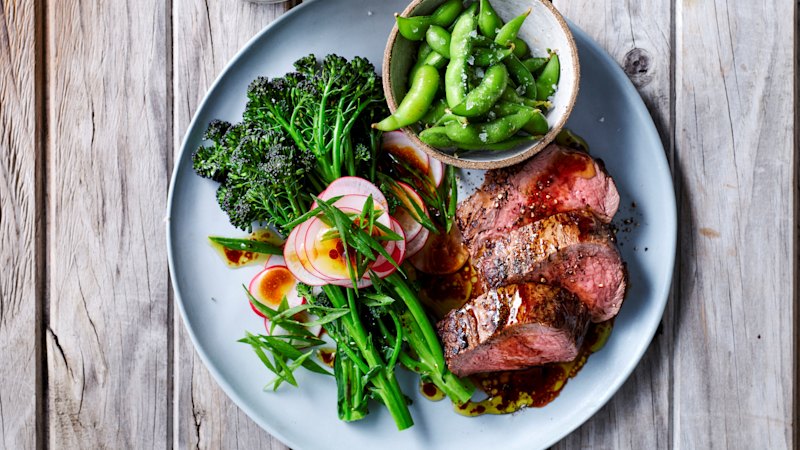 Big umami energy meets weeknight speed in this soy-marinated steak with loads of greens