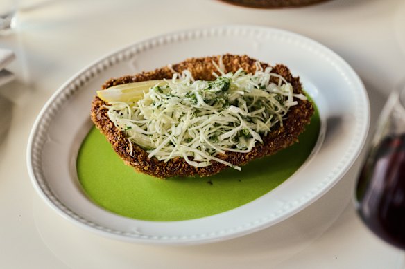 Wild venison schnitzel with parsley sauce and seasonal mix.