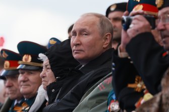 Russian President Vladimir Putin watches the Victory Day military parade in Moscow.