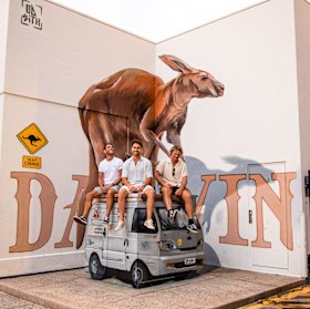 It’s different in Darwin. A city mural and its admirers.
