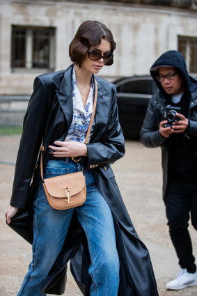 Model Kaia Gerber is seen in Paris wearing a vegan leather coat by Nanushka.