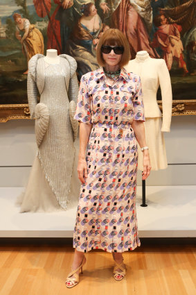 US Vogue editor Anna Wintour with the two Chanel pieces from her personal collection she has donated to the National Gallery of Victoria.