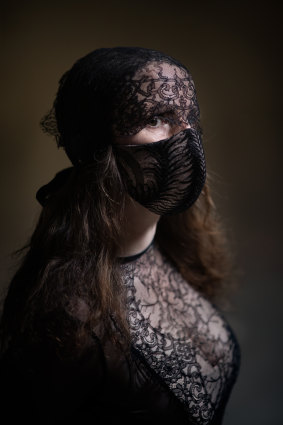 Gwendolynne Burkin in one of her other French lace masks.