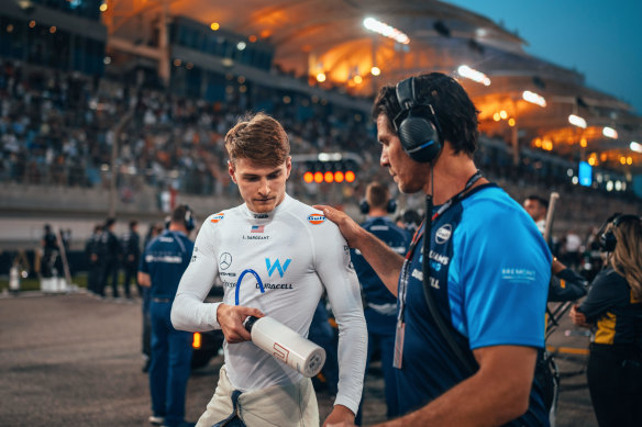 Former Australian rugby player Ben Jacobs (right) with Williams F1 driver Logan Sargeant.