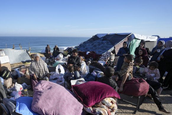 Displaced Palestinians arrive in central Gaza after fleeing from the southern Gaza city of Rafah.