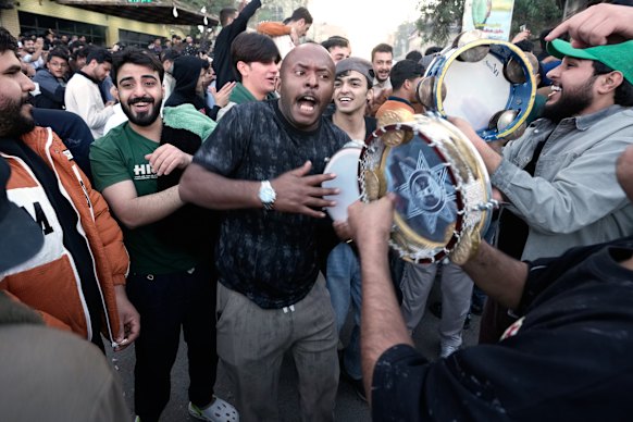 Iraqi fans celebrate in Baghdad.