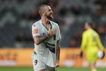 Roy O’Donovan celebrates the equaliser for the Jets on Friday night.