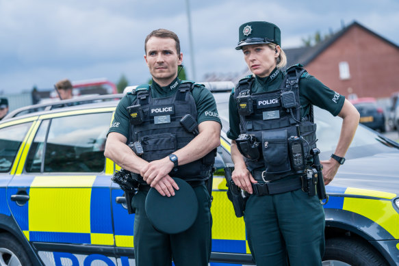 Stevie Neil (Martin McCann) and Grace Ellis (Siân Brooke) are frontline police in Belfast in <i>Blue Lights</i>.