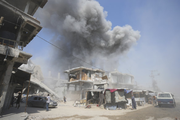 Smoke rises following Israeli bombardments in Khan Younis, Gaza Strip, on Monday.